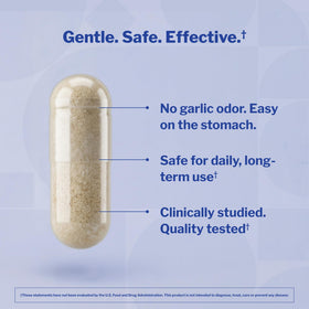 Vue des capsules Kyolic Aged Garlic Extract dans un verre