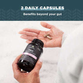 Vue des capsules SBO Probiotics Femmes sur une table