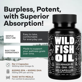 Wild Foods huile de poisson omega 3 1600mg capsules dans une main