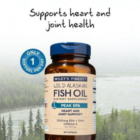 Wiley's Finest Huile de Poisson Peak EPA 90 Capsules à côté d'un verre d'eau