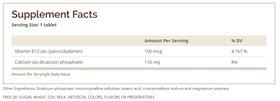 Windmill B-12 100 mcg Tablettes, bouteille avec prises de comprimés sur table