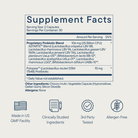 Zenwise Health Tribiotic capsules sur un fond naturel