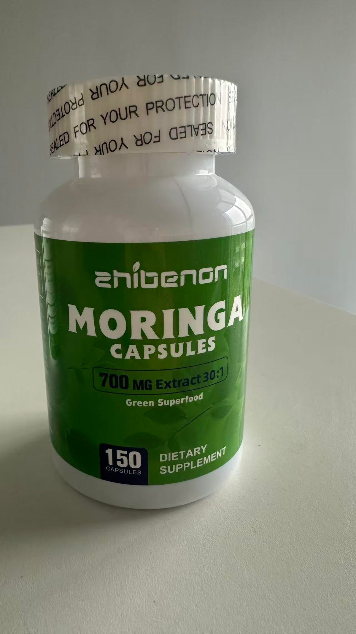 Zhibenon Extrait de Moringa avec capsules à côté