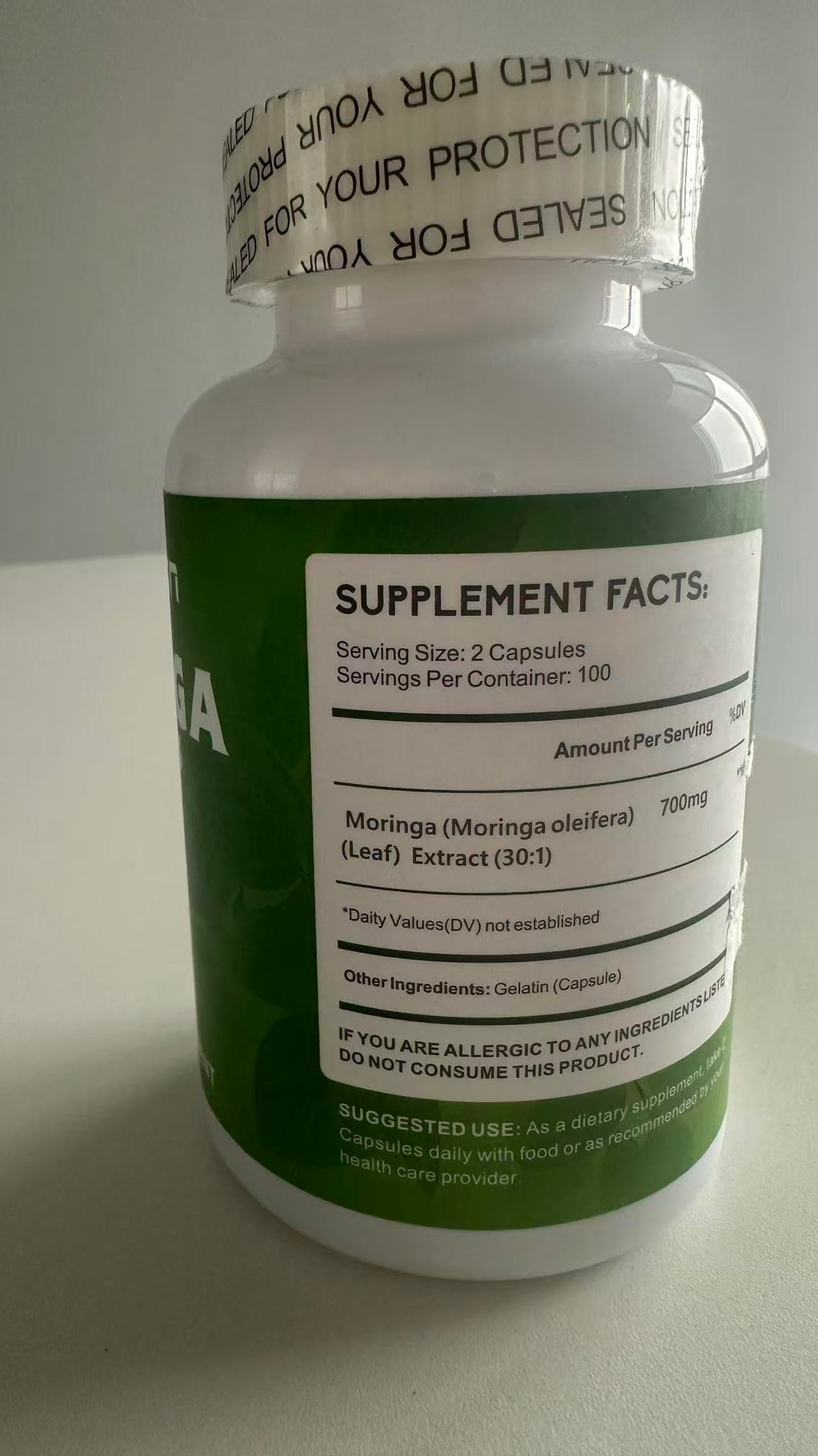 Zhibenon Extrait de Moringa Oleifera 700 mg capsules sur fond blanc