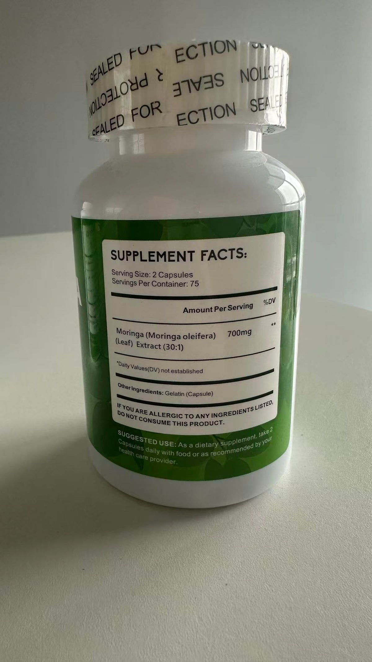 Zhibenon Extrait de Moringa ouvert avec capsules