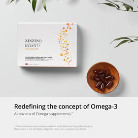 ZINZINO Essent+ Premium Omega Balance gélules dans une main