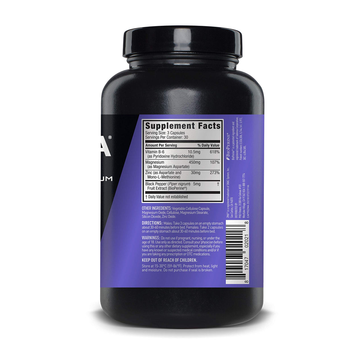 ZMA JYM Zinc & Magnésium sur une table avec un verre d'eau
